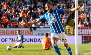 Kyle Vassell celebrates as Dundee United head for the Championship