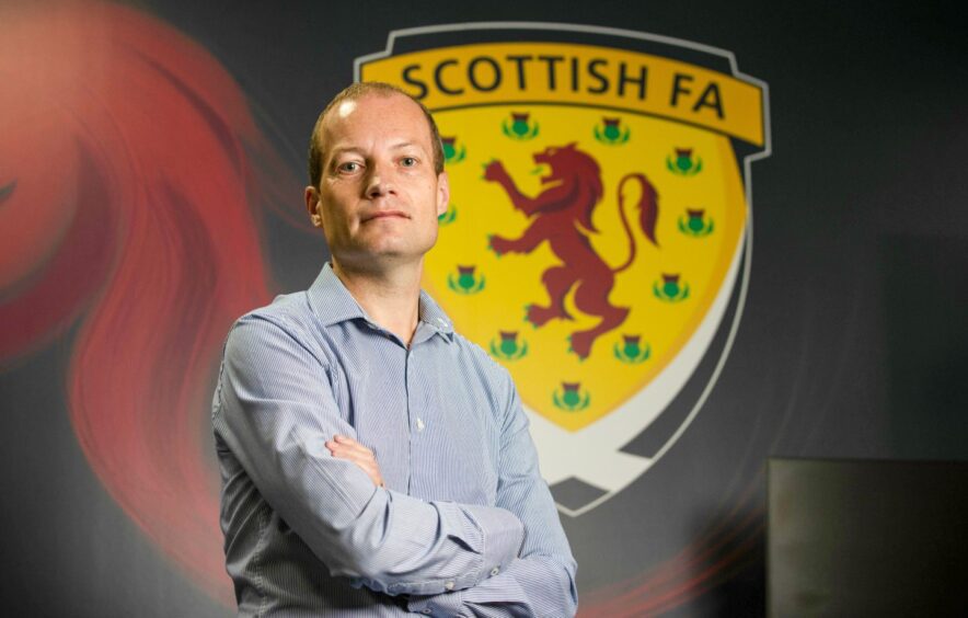 SFA head of refereeing Willie Collum in front of an SFA mural