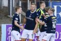 Dundee celebrate with Curtis Main after firing the side level against St Mirren. Image: Rob Casey/SNS