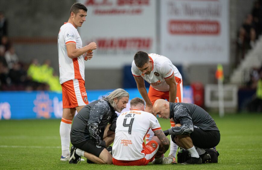 Kevin Holt hobbled off just before half time. I