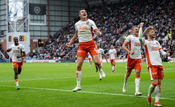 Ross Graham grabbed the only goal as Dundee United defeated Hearts at Tynecastle. Image: SNS