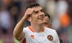 Dundee United defender Ross Graham celebrates his winning goal against Hearts