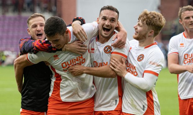 Dundee United's Kristijan Trapanovski, Ross Graham, Vicko Sevelj, and Luca Stephenson celebrate at full-time. Image: Paul Devlin/SNS Group