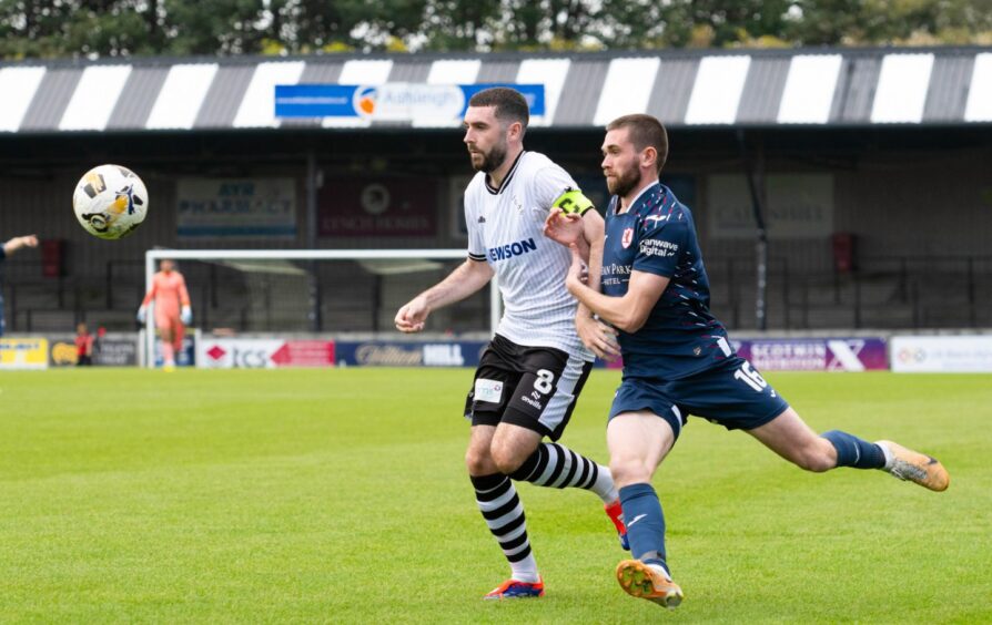 Sam Stanton challenges for the ball during Raith Rovers' defeat to Ayr United.