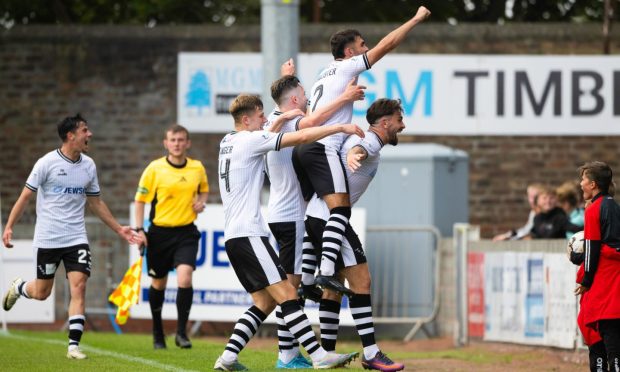 George Oakley celebrates completing Ayr United's stunning second-half comeback.