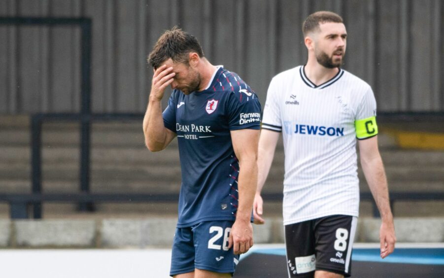 Lewis Stevenson holds his head in his hands as Raith Rovers lose to Ayr United.