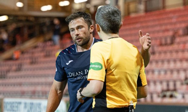 Lewis Stevenson is spoken to by the referee during Raith Rovers defeat to Dunfermline Athletic.