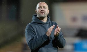 James McPake claps for the Dunfermline Athletic fans.