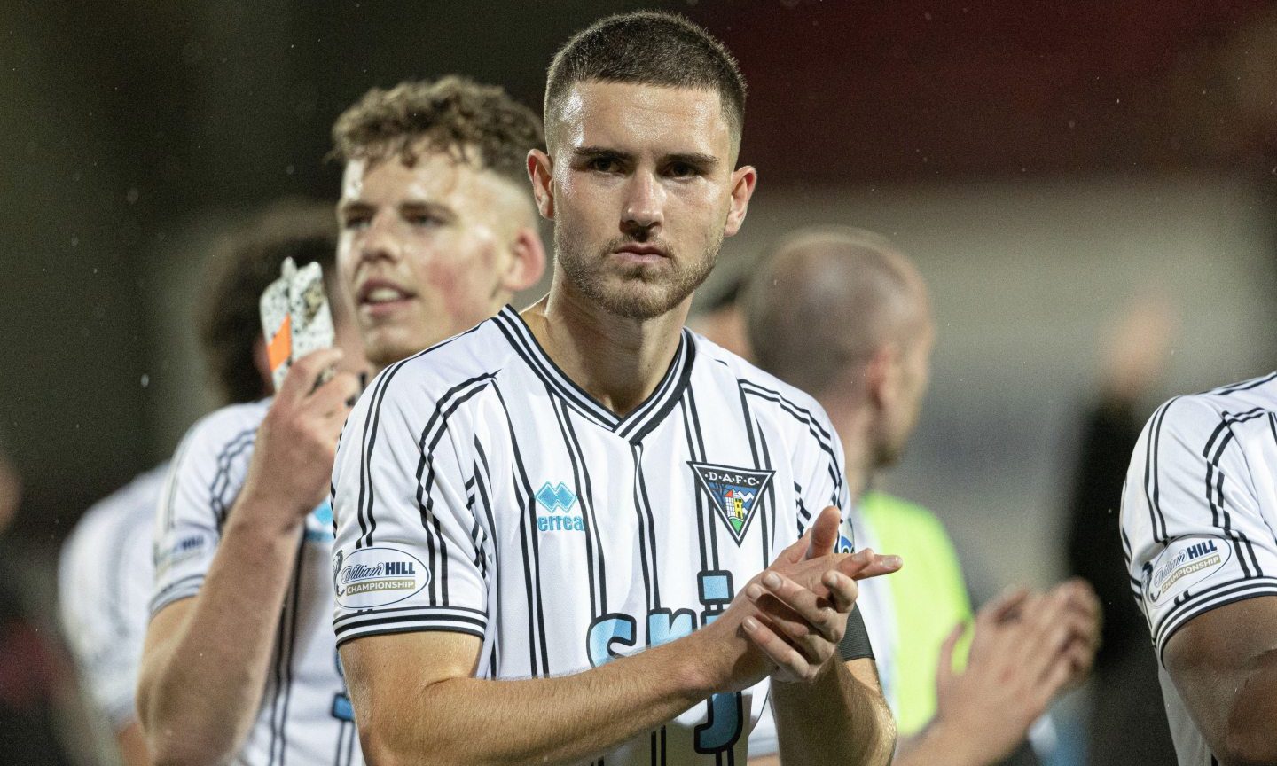 Tommy Fogarty and Sam Young clap the Dunfermline Athletic F.C. fans.