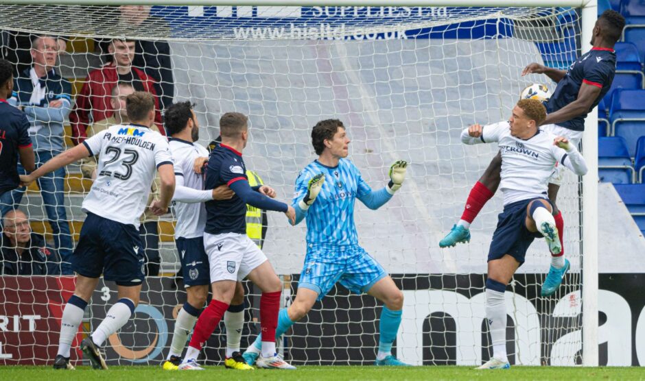 Akil Wright gives Ross County the lead against Dundee. Image: Paul Devlin/SNS