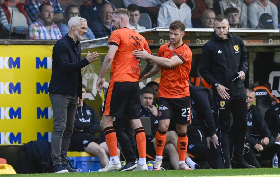 Dundee United captain Ross Docherty replaces Kevin Holt with 34 minutes on the clock