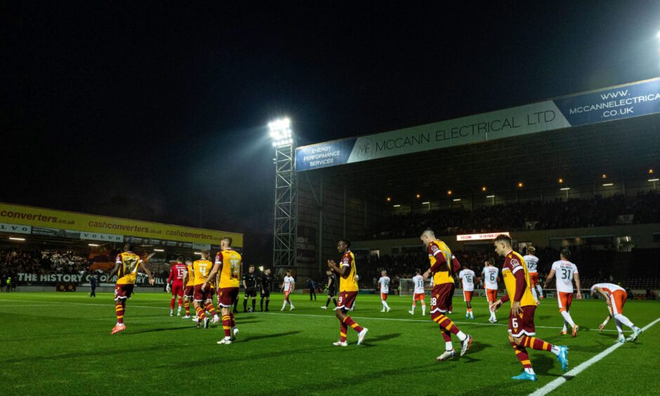 A crowd of more than 8,000 packed into Fir Park under the lights