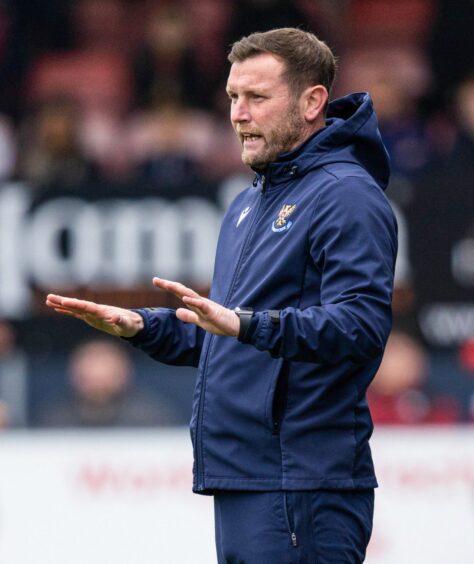 Andy Kirk gestures while on the touchline for St Johnstone against Ross County.