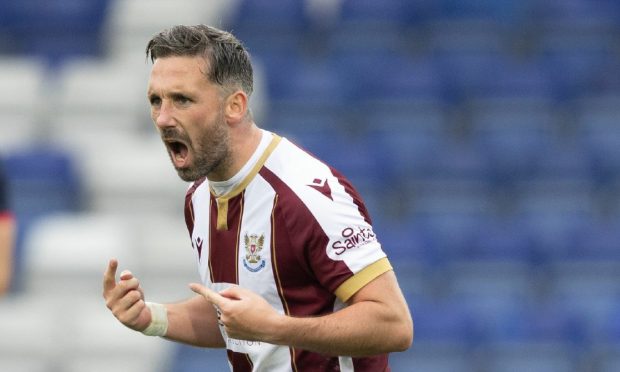 Nicky Clark gestures while on the pitch for St Johnstone