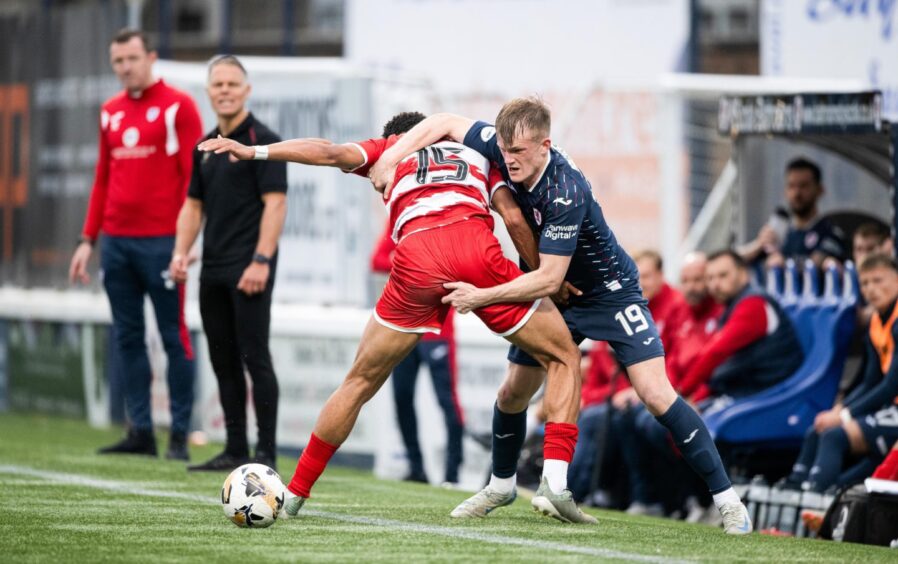 Finlay Pollock tussles for the ball during his debut for Raith Rovers.