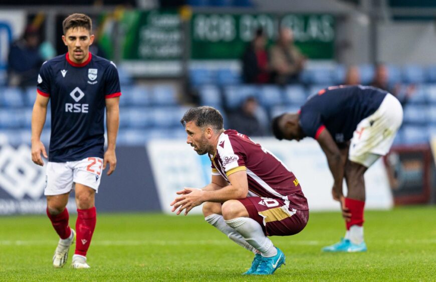 A dejected Nicky Clark at full-time after the draw with Ross County.