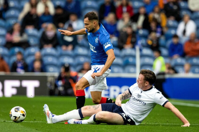 Jordan McGhee challenges Rangers winger Nedim Bajrami. Image: Craig Williamson/SNS