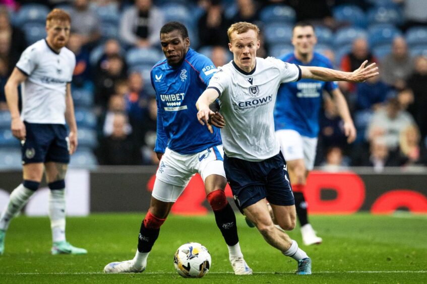 Scott Tiffoney takes on Dujon Sterling. Image: Alan Harvey/SNS