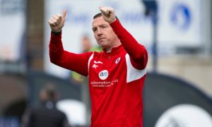 Manager Neill Collins gives the thumbs up to the Raith Rovers supporters.