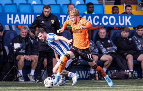 Dundee United's Luca Stephenson skips past Kilmarnock's Matty Kennedy at Rugby Park. Image: Alan Harvey/SNS