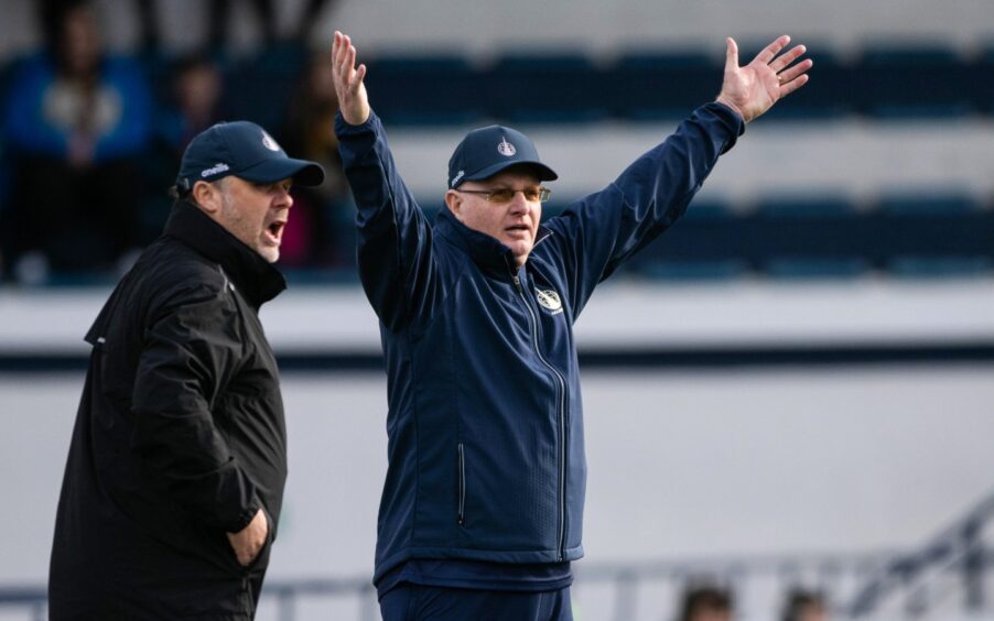 Falkirk's Paul Smith and John McGlynn appeal to the referee from the sidelines.