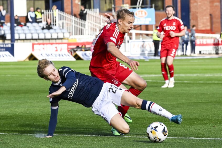 Braybrooke gets a foot in against Aberdeen. Image: Rob Casey/SNS