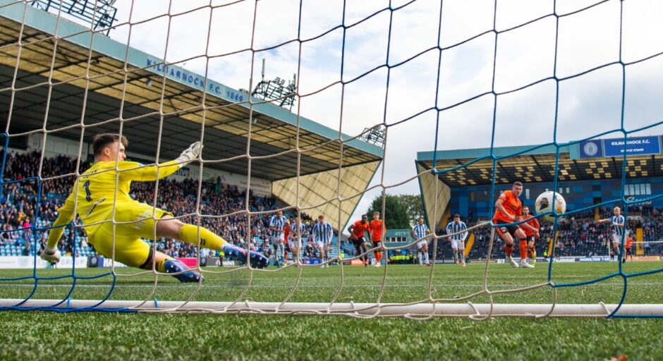 Cool Ross Graham finds the corner for Dundee United