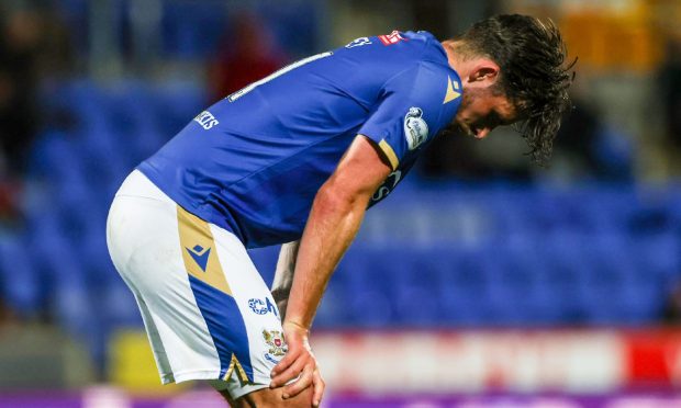 St Johnstone's Graham Carey shows his dejection.