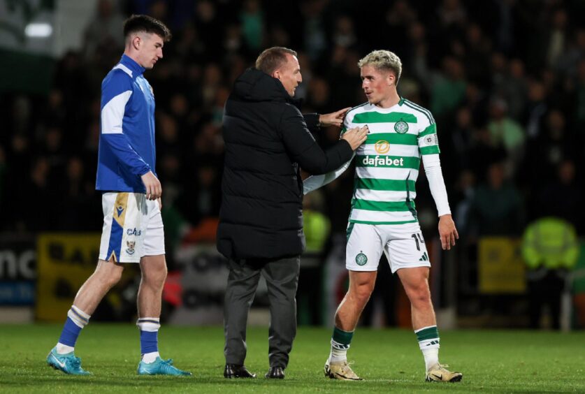 Celtic's Luke McCowan and manager Brendan Rodgers at full-time. 