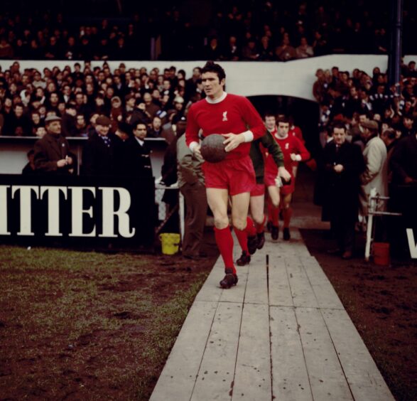 Liverpool captain Ron Yeats leads his Liverpool side out.