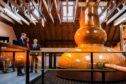 The Earl and Countess of Strathearn alongside Neil Cameron Production Manager, Glenturret Distillery, when it was known as The Famous Grouse Experience. Image: Steve MacDougall/ DC Thomson.