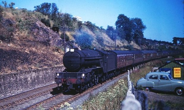 An Aberdeen to Edinburgh express passing Caledon Shipyard in 1962.
Image: Scott Cunningham.