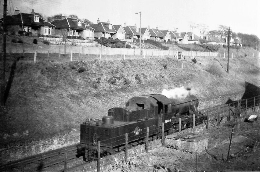 The Carmyllie Pilot at Stannergate with houses in the background