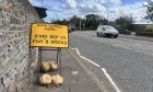 Signs warning of the roadworks in Broughty Ferry. Image: Ellidh Aitken/DC Thomson