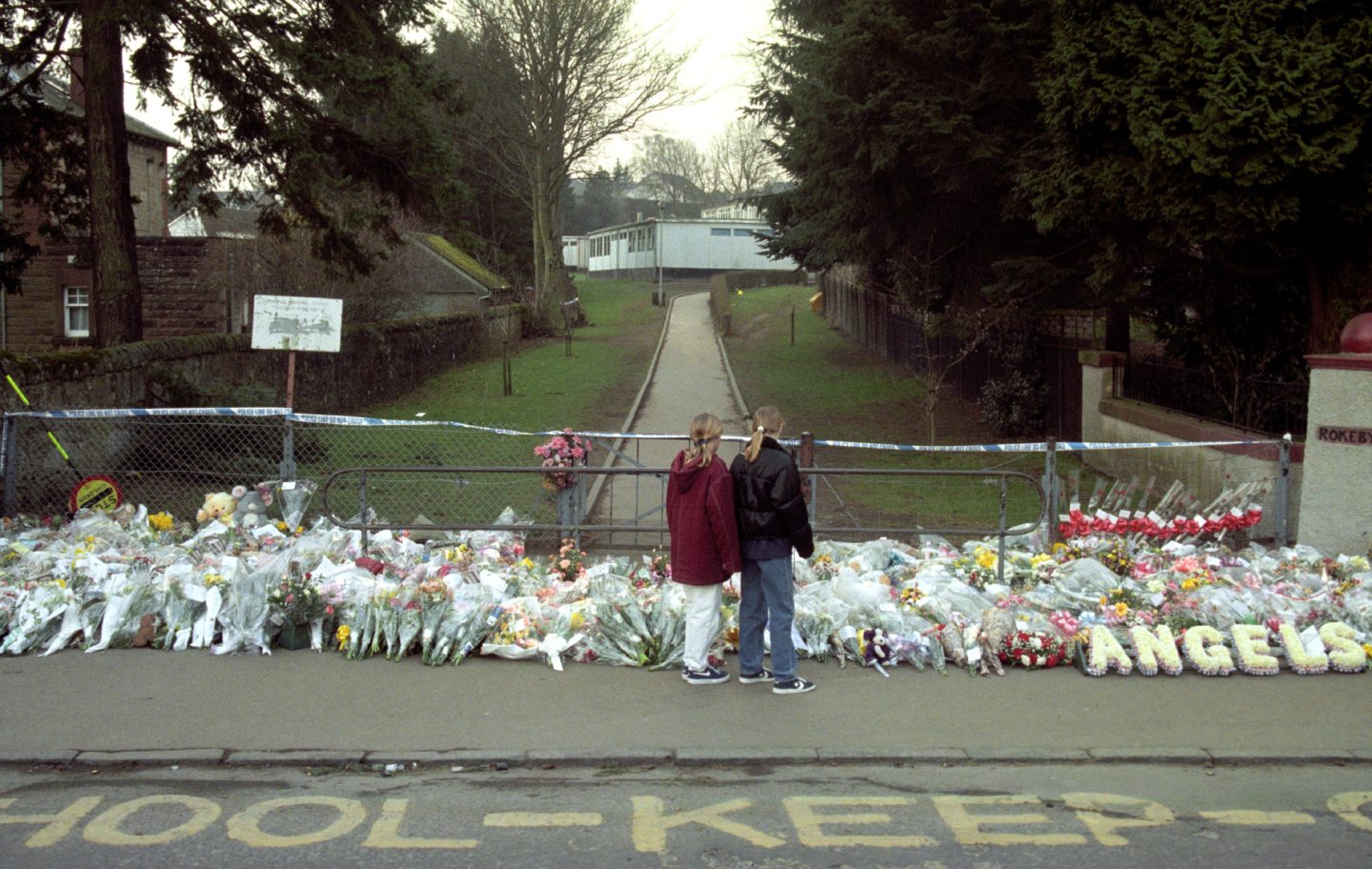 Floral tributes outside Dunblane Primary School following the tragedy