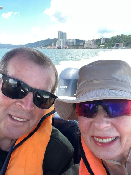 Allan and his wife Sheila leaving Sandakan on their way towards the Borneo Rainforest.