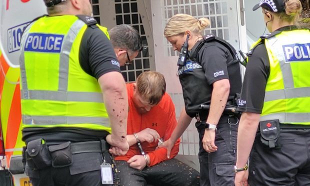 Andrew Pattie caught outside court