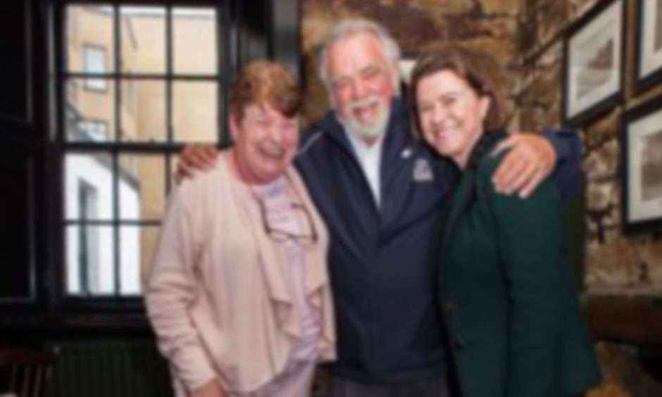 Herb Kohler and wife Natalie flew in to say farewell to golf's most famous landlady Antoinette Leask (left) at the Jigger Inn, St Andrews, a few years ago.