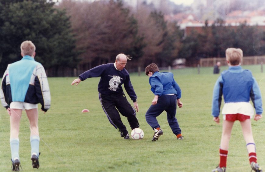 Former England footballer Bobby Charlton at Dundee with his one-day sports school.