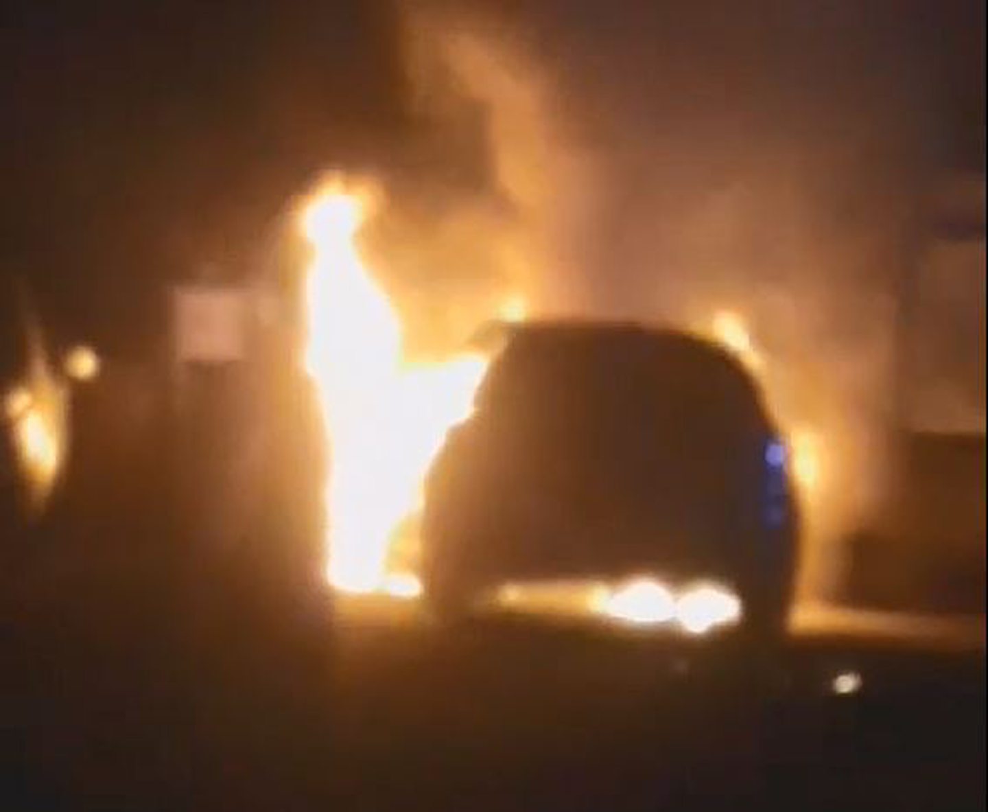 Arbroath Fire Police guard home after car fire on Arbroath Road in Dundee