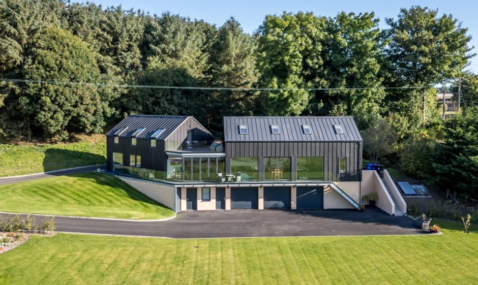 Zinc-clad home Church View was designed by Voigt Architects.