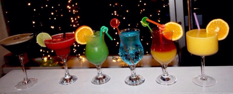 row of colourful cocktails 