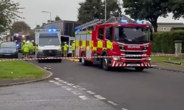 Emergency crews at the scene on Den Walk, Methil after crash between van and lorry