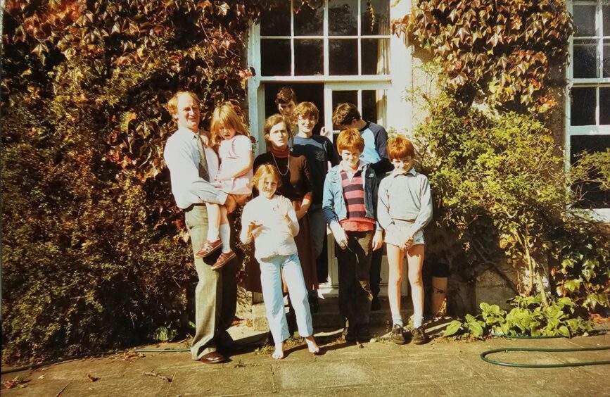 Andy with his wife Clare and their seven children at home in Kingsbarns in 1985.