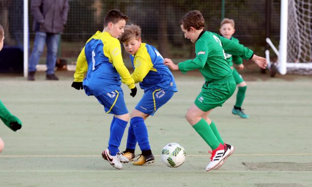 Evening telegraph sport CR0005049 G Jennings pics, SSFA Junior schools sevens at Dawson park, Longhaugh V Craigowl, friday 7th december.