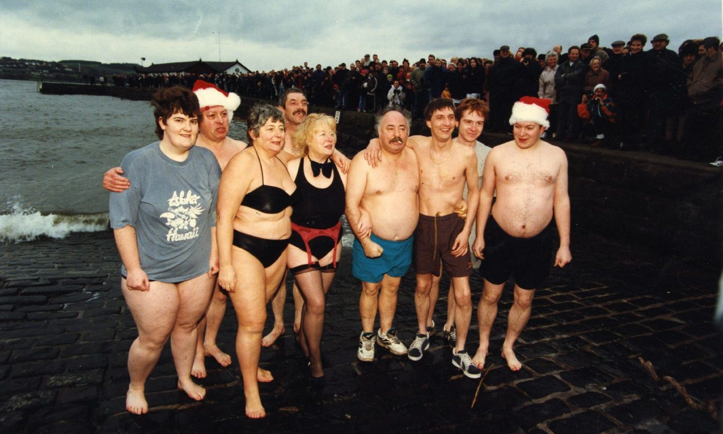 A group taking part in the New Year Dook in January 1998. Image: DC Thomson.