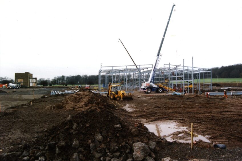 diggers are on site and the metal frame of a building is visible as the Virgin cinema starts to take shape in January 1999.