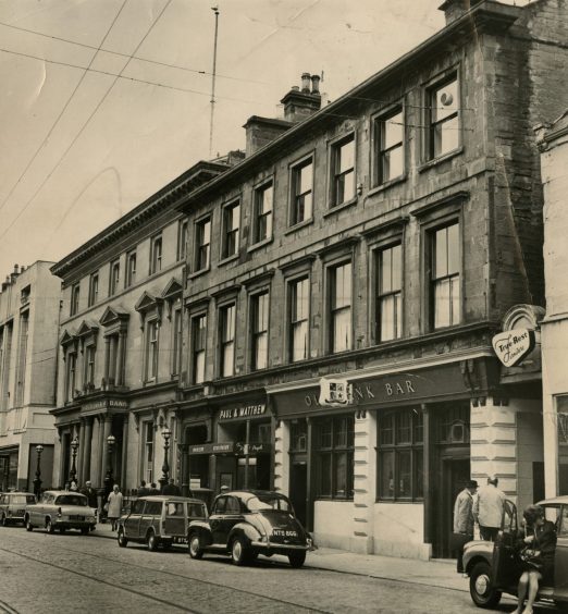 cars parked on the street outside Dundee pub The Old Bank Bar 