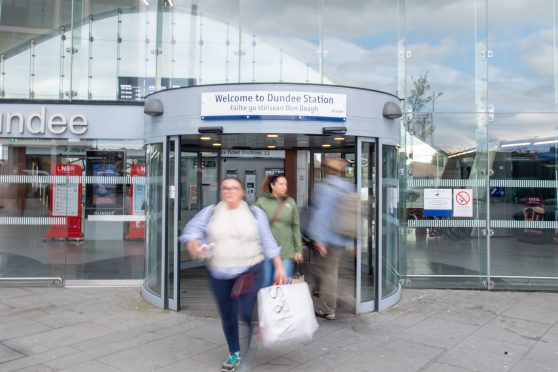 Train passengers make their way in and out of Dundee train station. Image: Kim Cessford/DC Thomson.