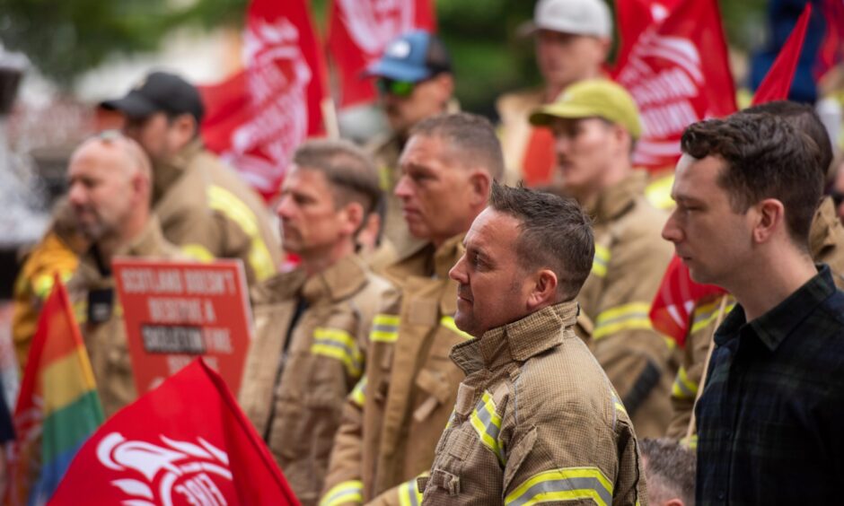A consultation over proposed fire service cuts has been launched. Picture shows firefighters at a protest rally